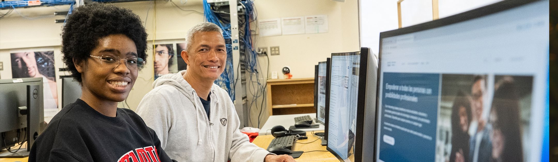 Two students in computer lab.
