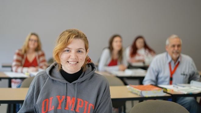 Female student in classroom. 