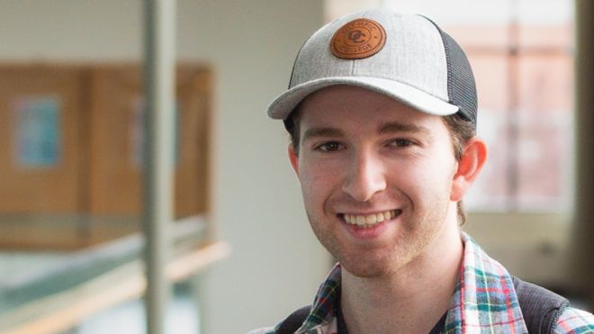 Male student in hat