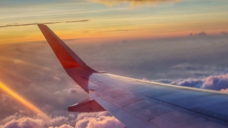 airplane wing in sky
