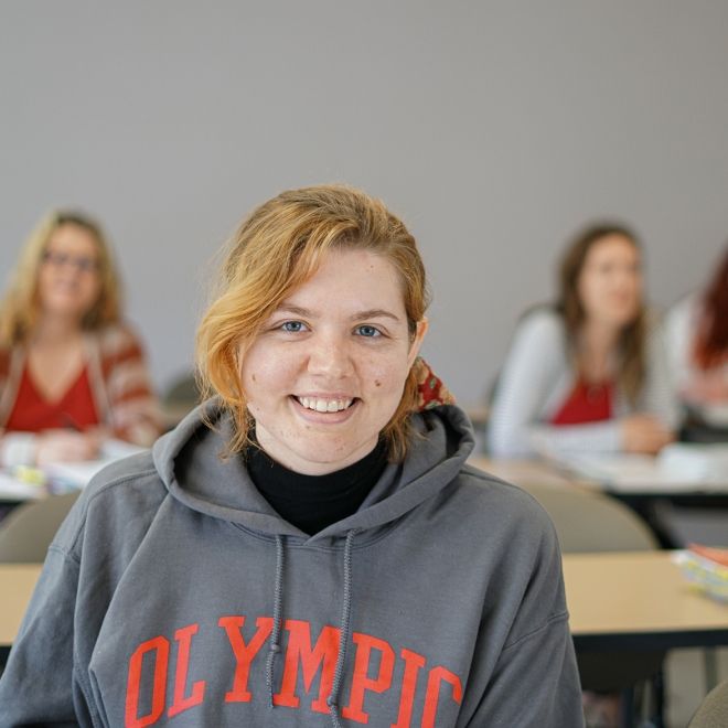 Female student in classroom.