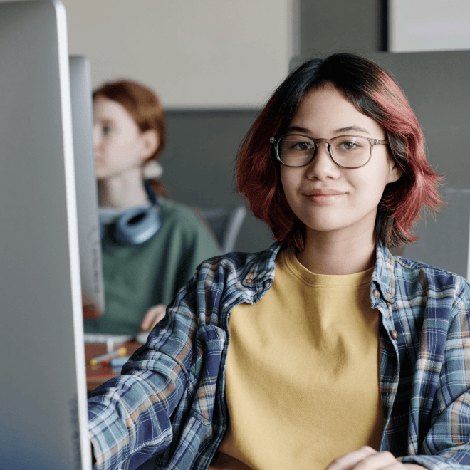Student at computer.