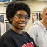 Two students in computer lab. 