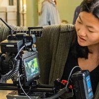 Film school student using camera.