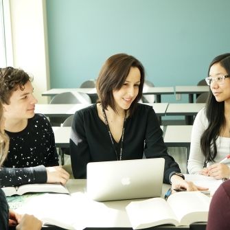 Teacher in classroom.