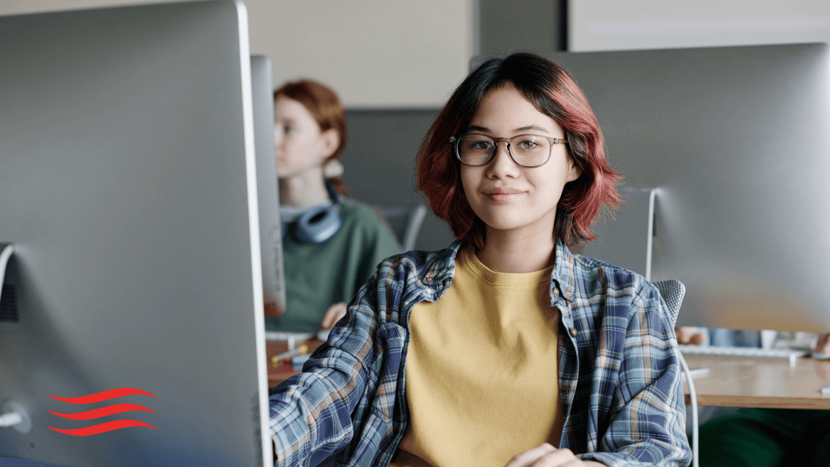 Student at computer.