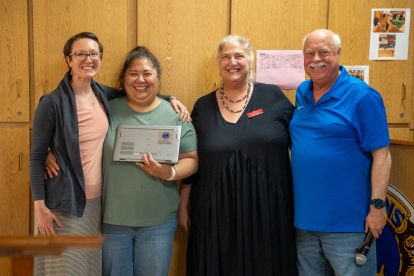 Sara Hewson, Odessa Kawai, Wendy Coates, and Jeff Reynolds pose for a photo.