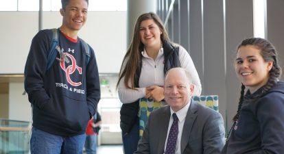 President Cavalluzzi and students.