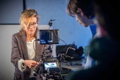 Film faculty with camera