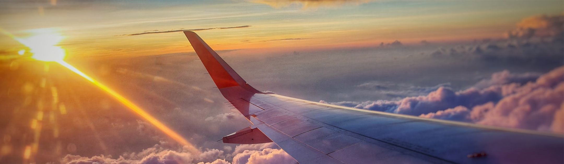 airplane wing in sky