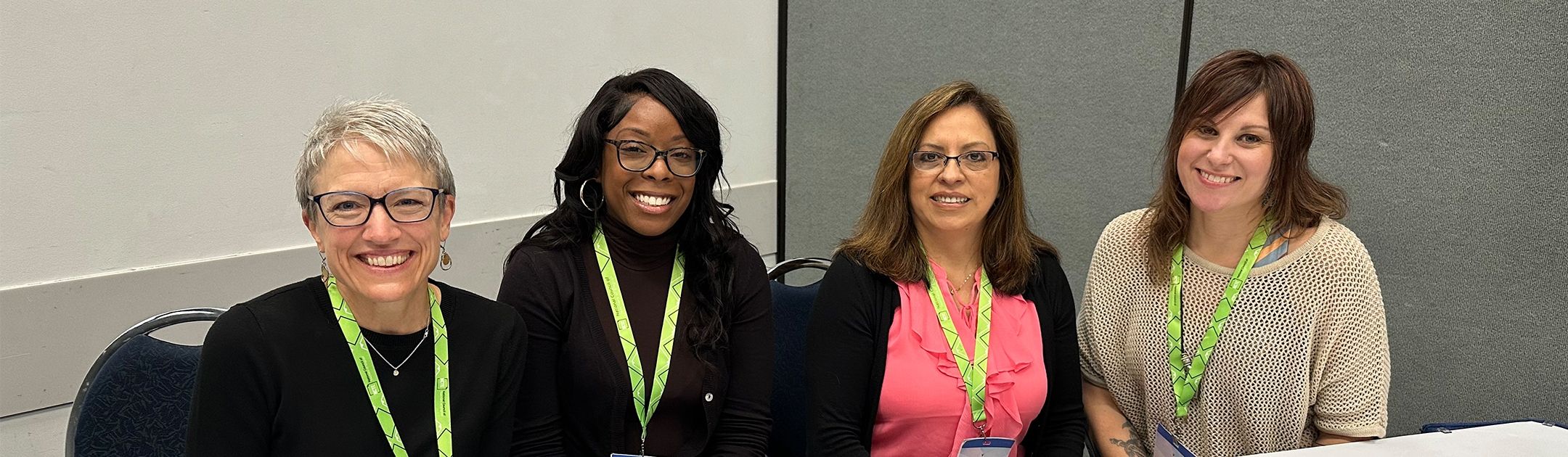 Four females sitting together.