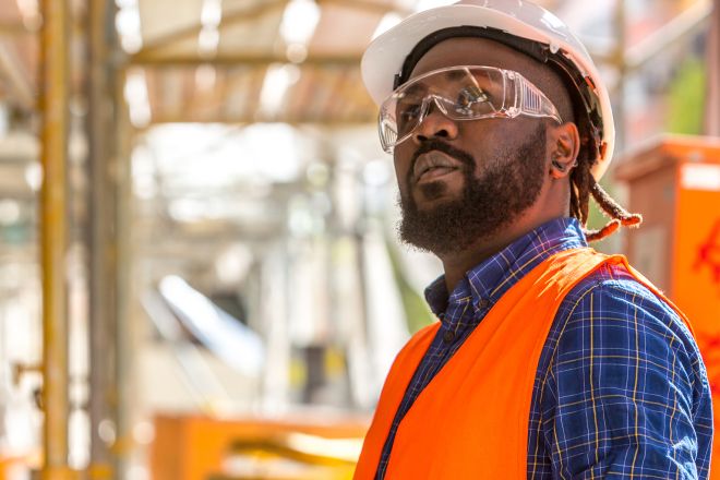 Male in hardhat and safety glasses