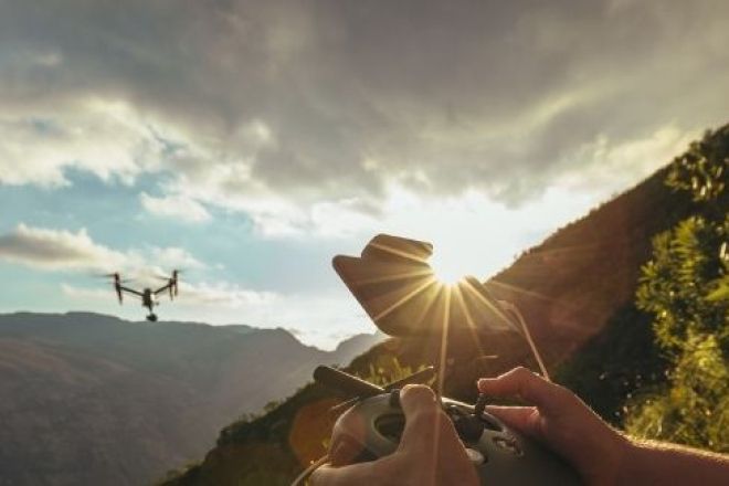Landscape with a drone in the air