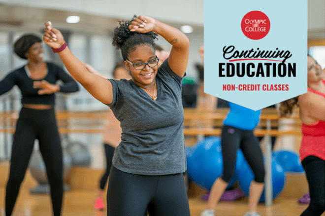 Woman dancing in a gym with other participants and fitness balls in the background. Text reads, "Olympic College Continuing Education Non-Credit Classes"