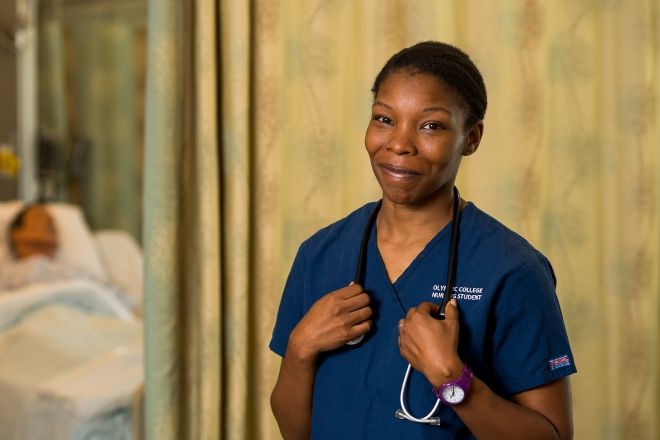 Nursing Student in Blue Scrubs