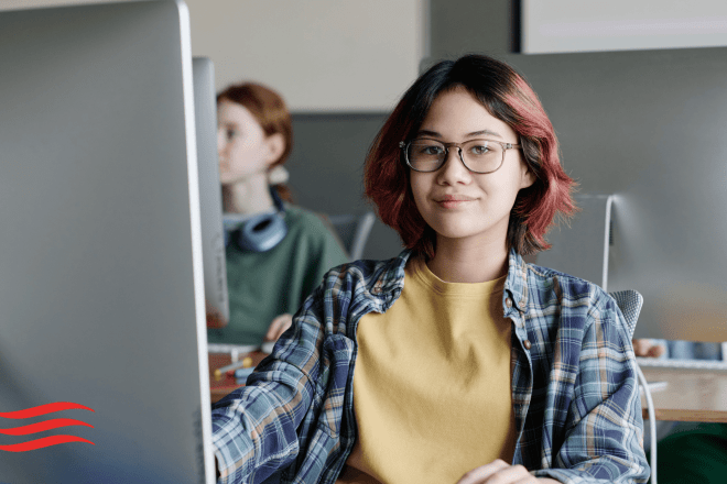 Student at computer.