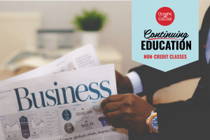Closeup of man wearing a suit holding the business section of a newspaper. Text reads, "Olympic College Continuing Education Non-Credit Classes"
