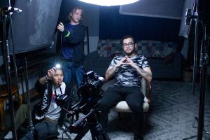 Film students with lighting equipment