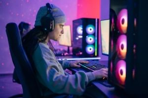 Student playing computer video game