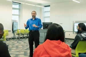 Male Instruction in classroom.