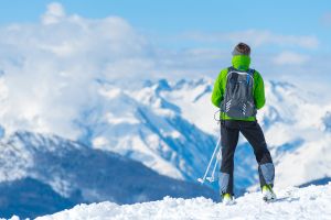 Man on top of mountain. 