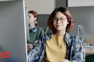 Student at computer.