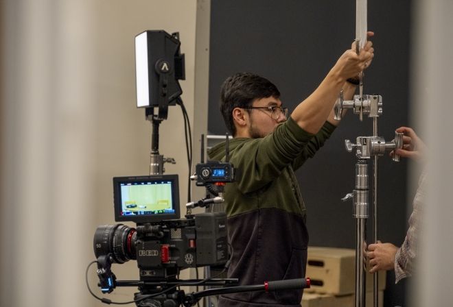 Filmmaking student on set