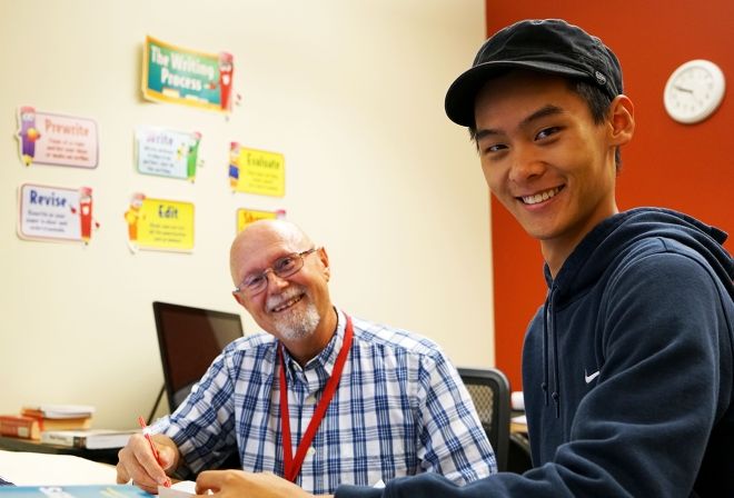 Tutor with student in Writing Center.
