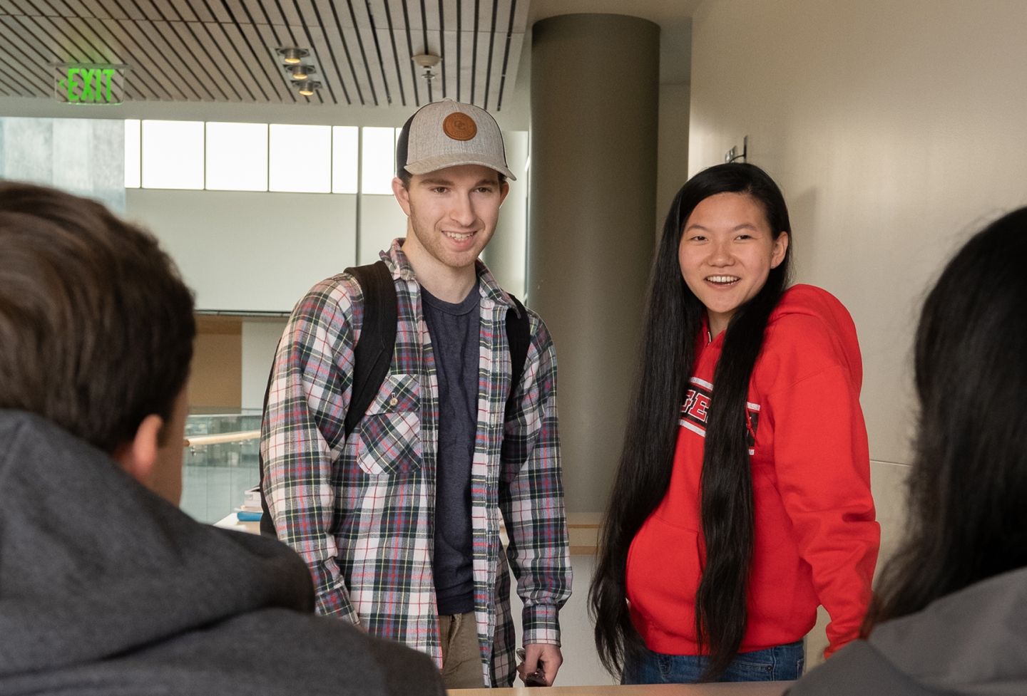 Student at table together.