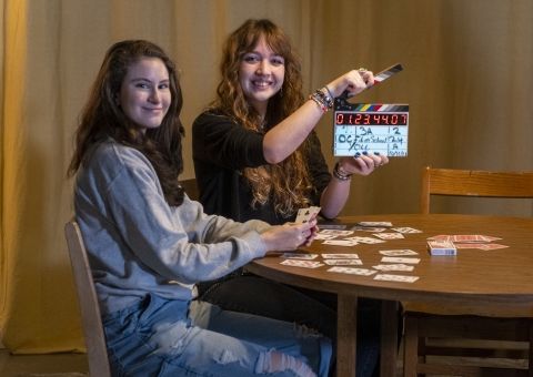 Film students smiling on set