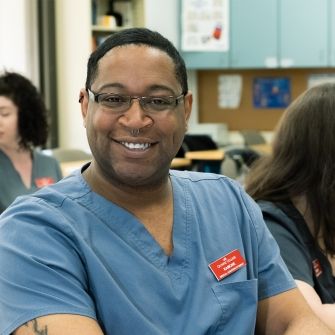 Male medical assisting student.