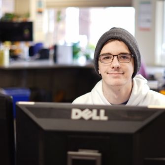 Student worker at computer